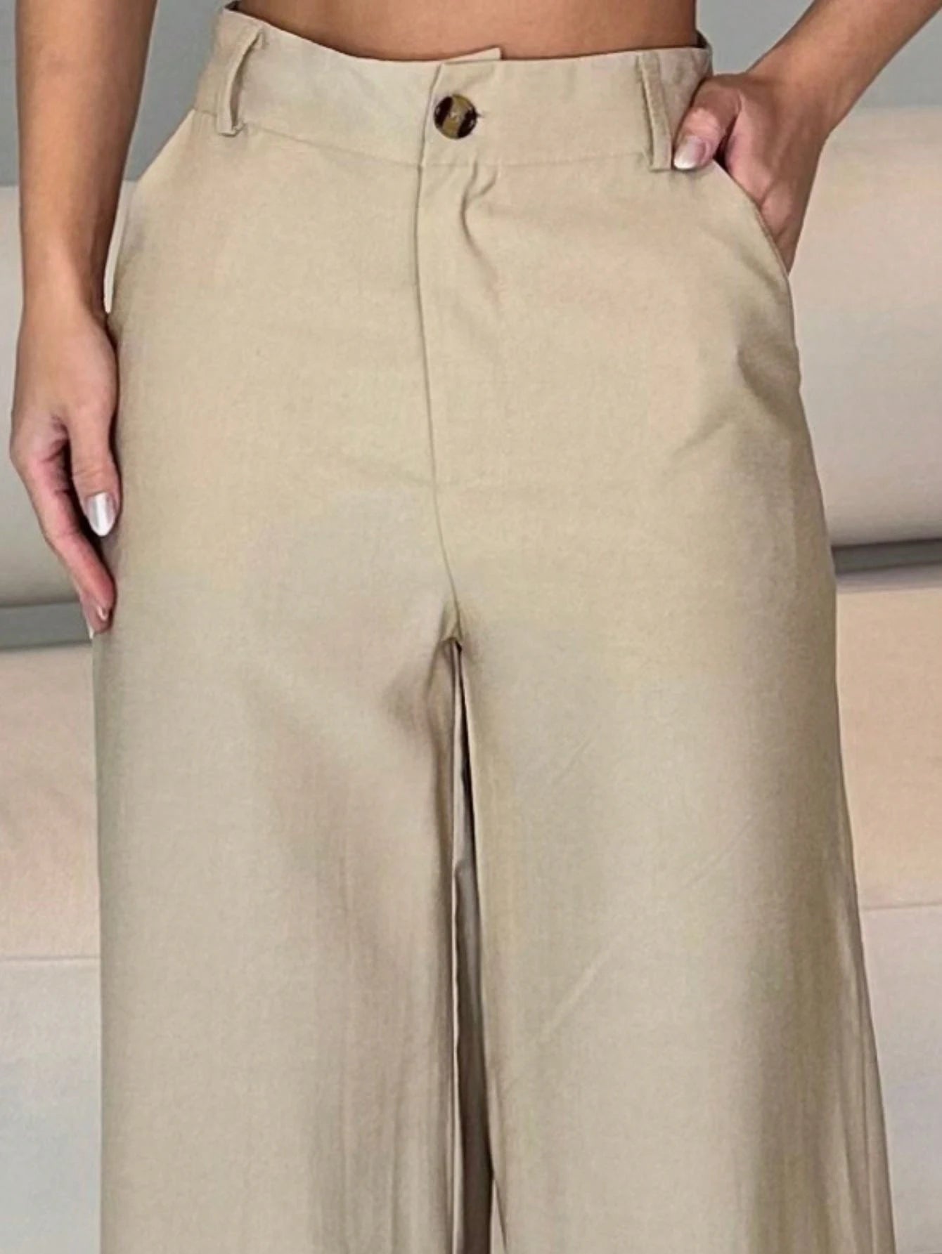 Calça pantalona com bolso