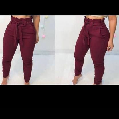 Modelo usando calça clochard Marsala bengaline com laço na cintura – visual moderno e confortável